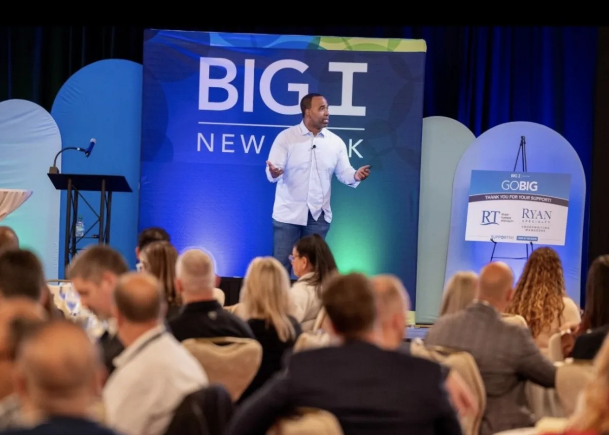 Marques Ogden speaking at a Big I Network event